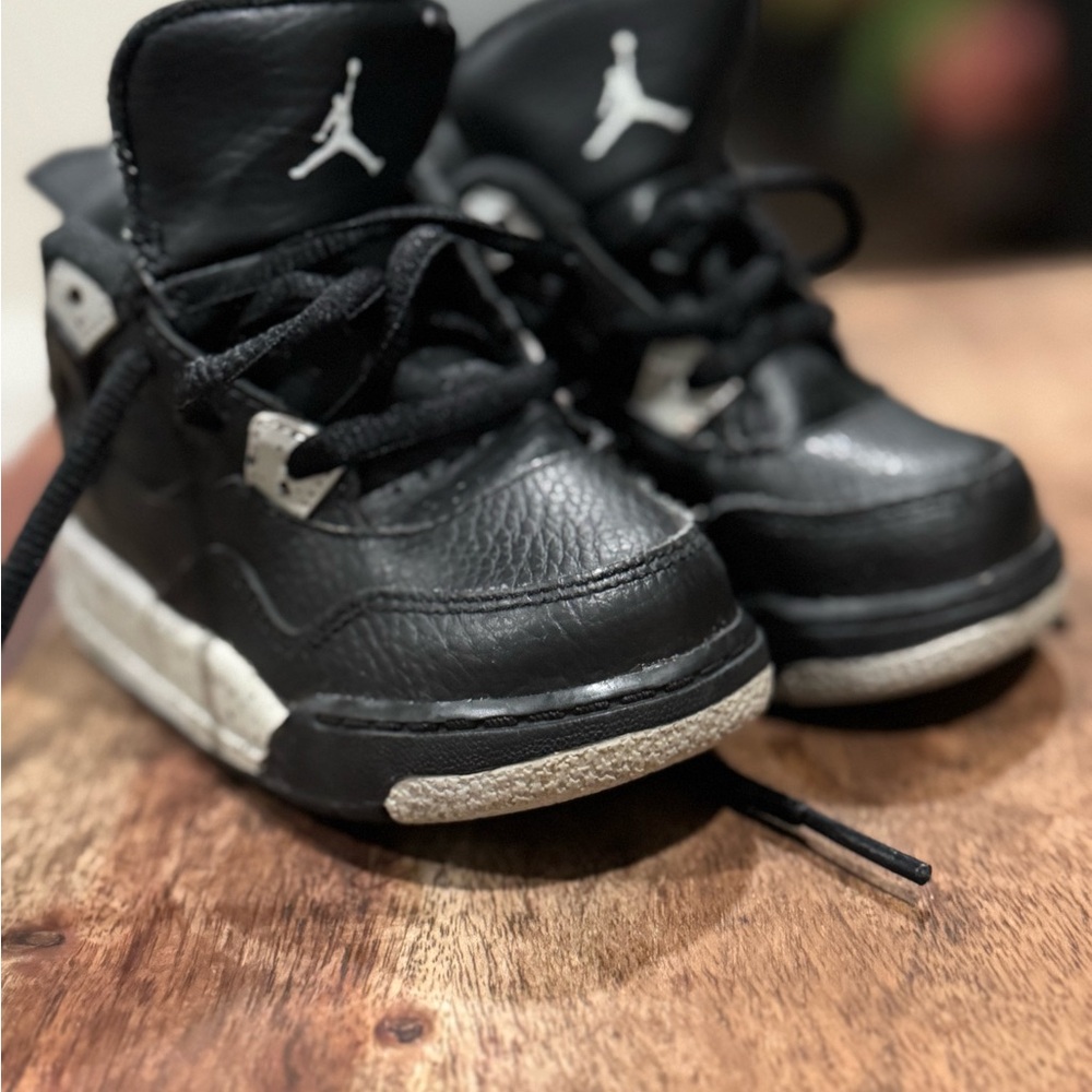 Sold Jordan Black and White Sneakers with Iconic Jumpman Logo